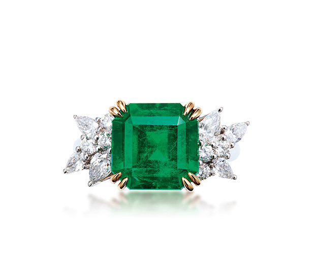 A 5.04 CARAT COLOMBIAN ’muzo green’ EMERALD AND DIAMOND RING