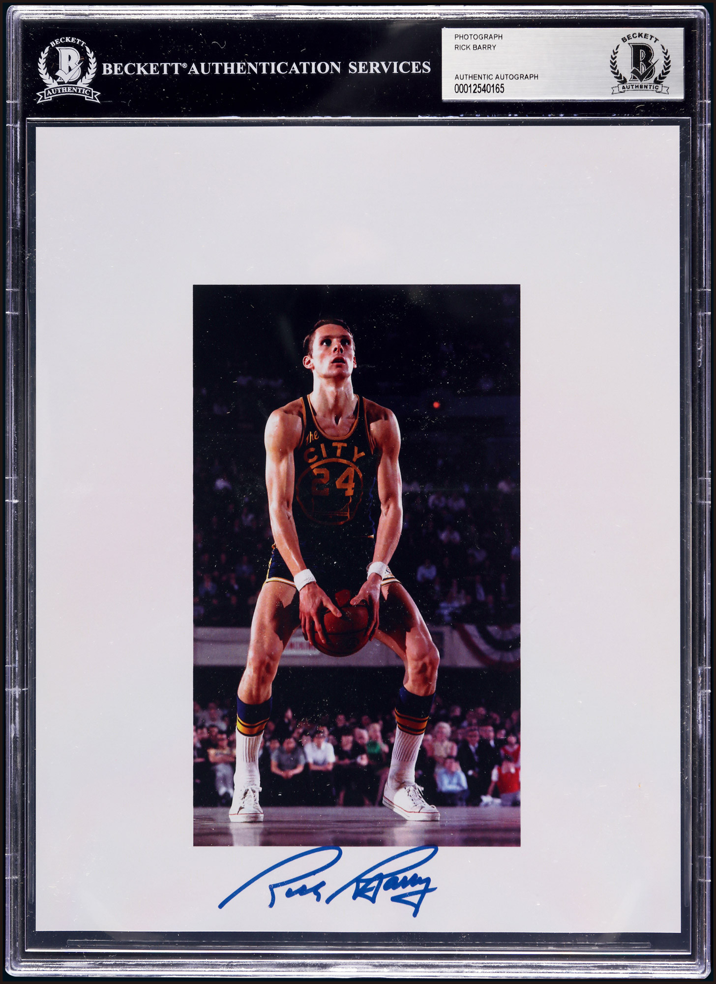 The autographed photo of Rick Barry, the legendary NBA star