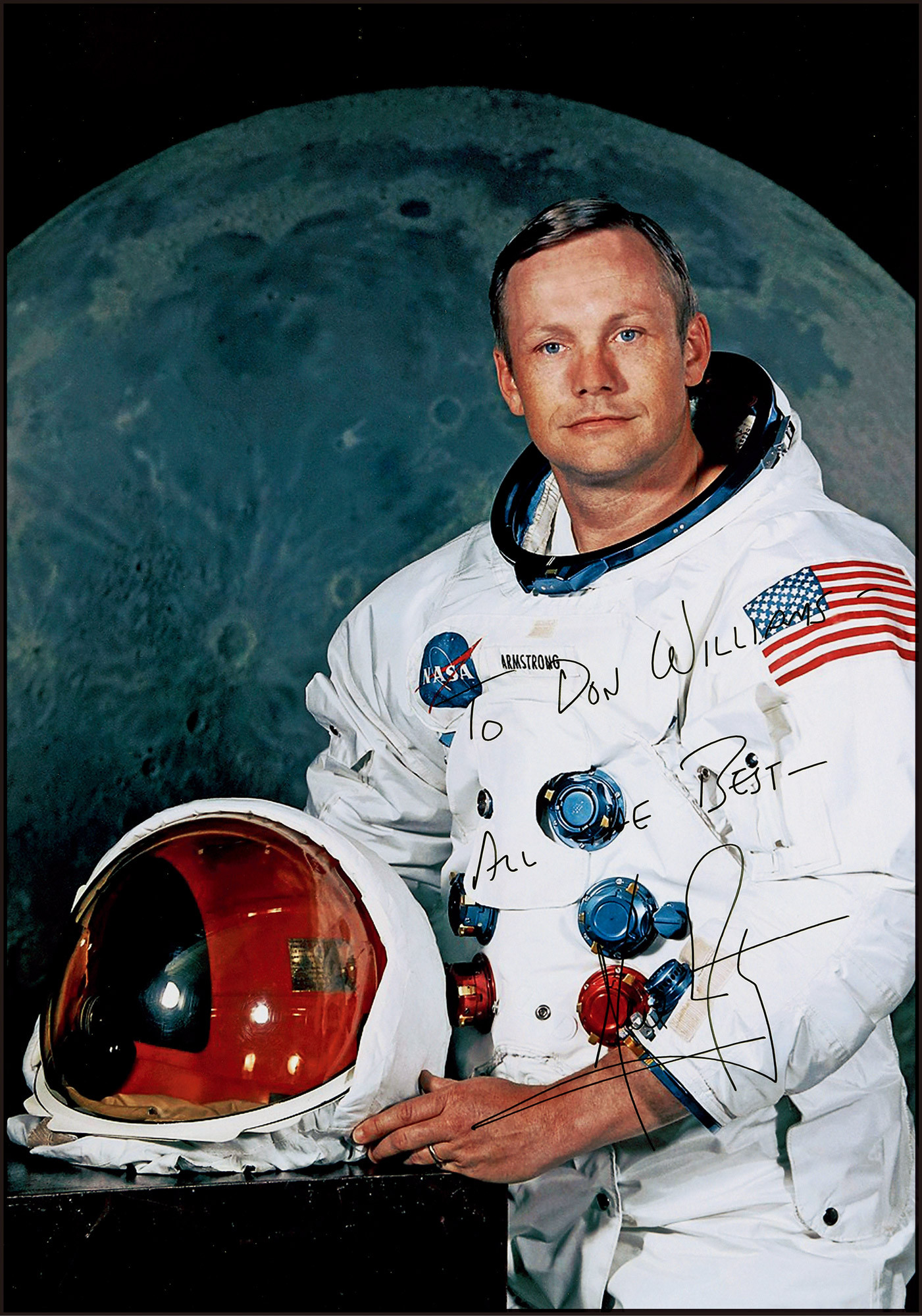 The autographed photo of Neil Armstrong, the first man to land on the moon, with a certificate