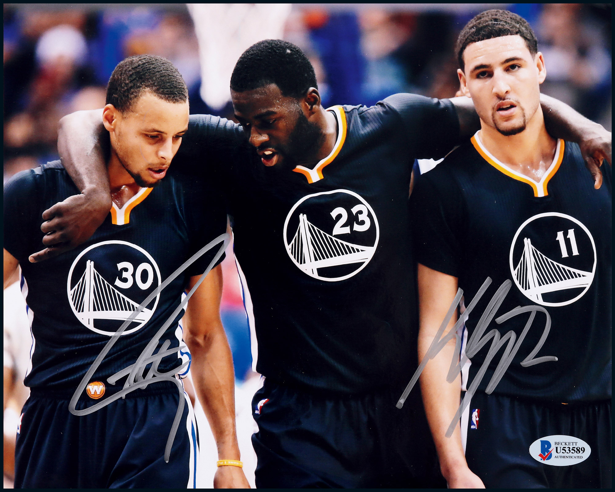 The autographed photo of Stephen Curry and Klay Thompson, the “Splash Brothers”, with certificate