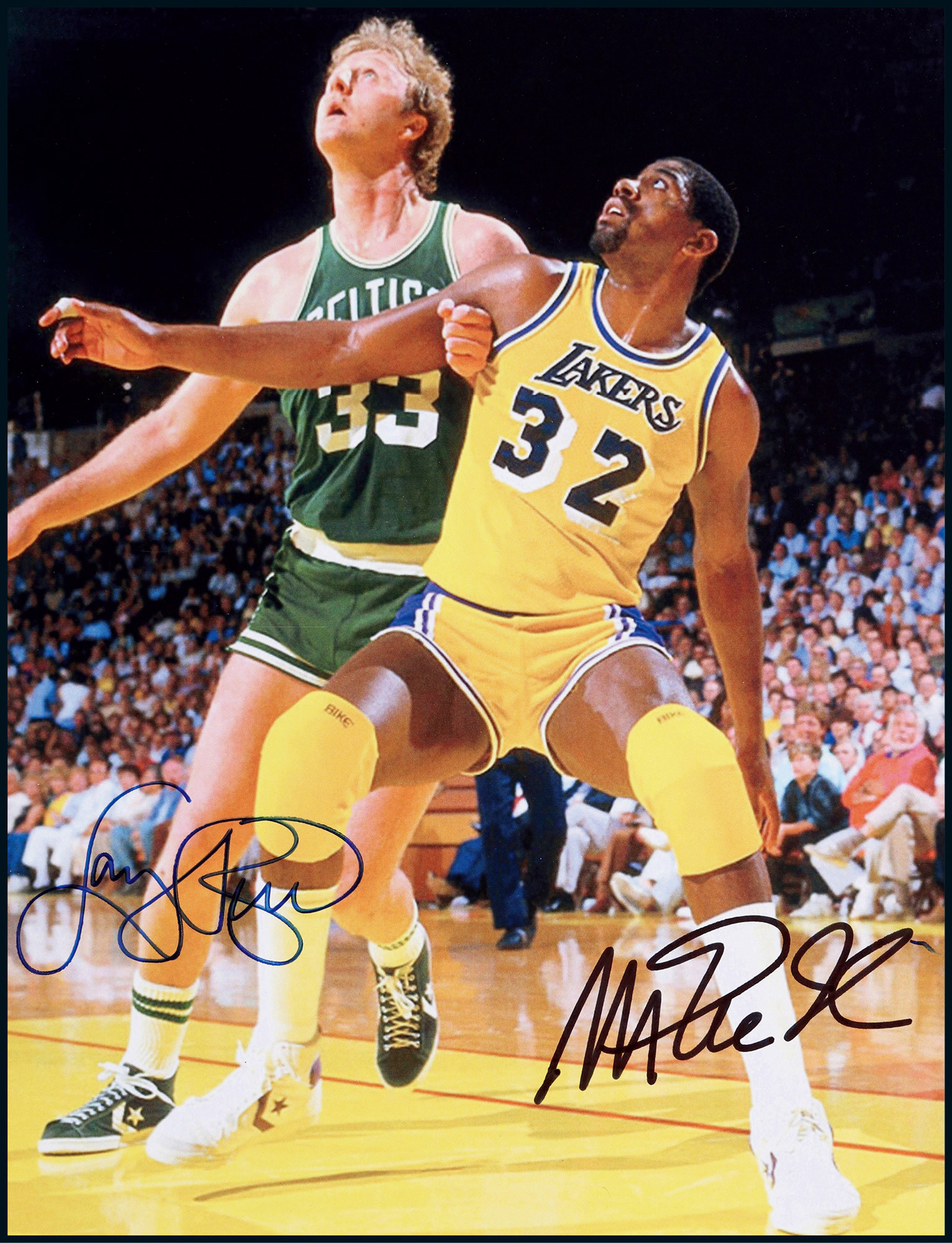 The autographed photo of Magic Johnson and Larry Bird, the legendary NBA star, with a certificate