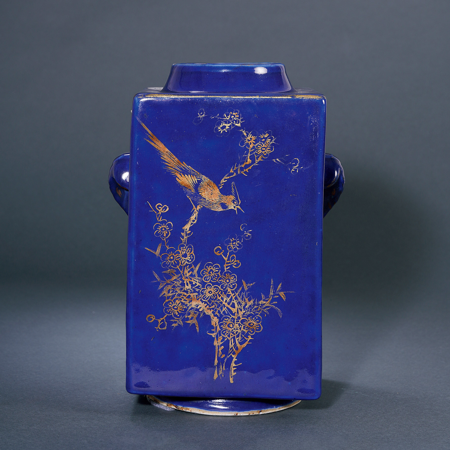 A BLUE GLAZE AND FAMILLE-ROSE AND GILTED CONG-SHAPE VASE