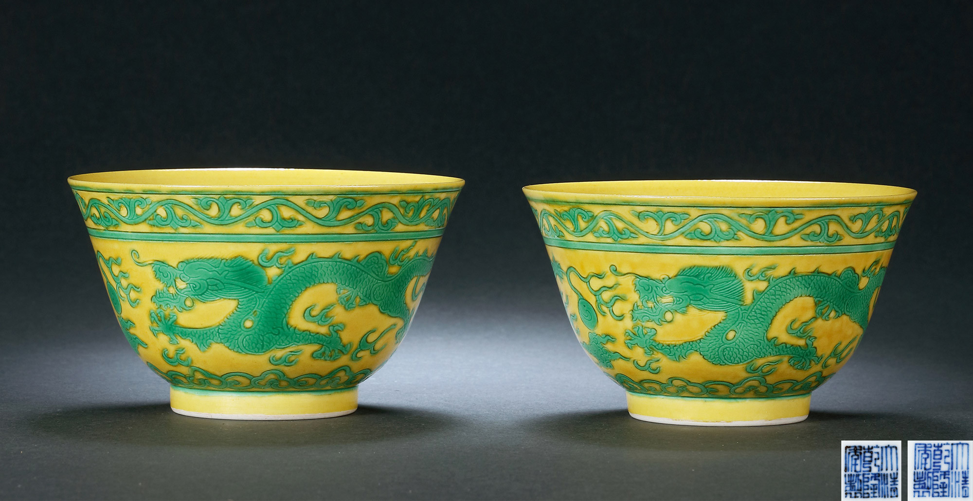 A PAIR OF YELLOW GROUND AND  GREEN ENAMELED BOWL