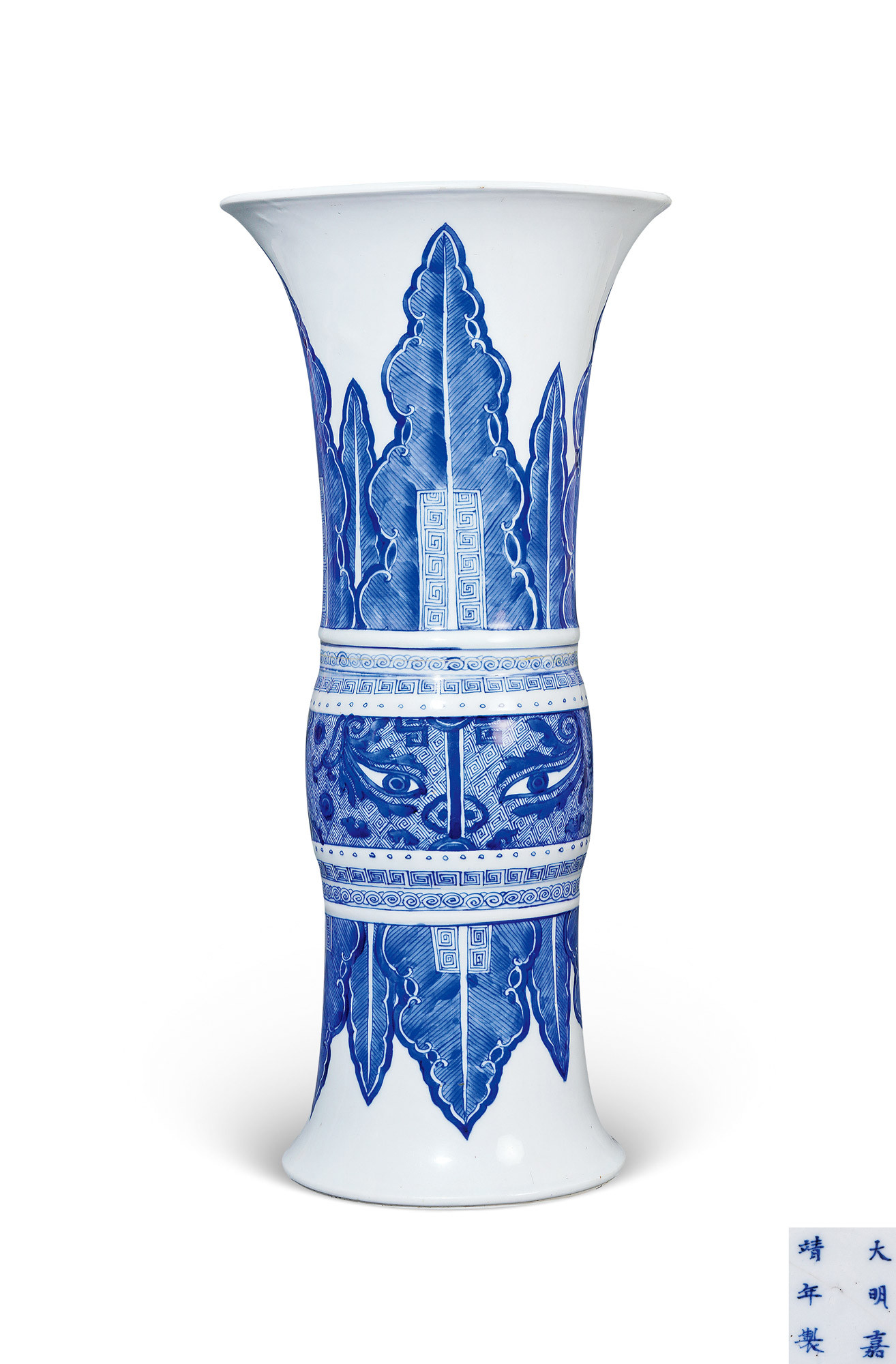 A BLUE AND WHITE BEAKER-SHAPED VASE WITH MYSTICAL BEAST DESIGN