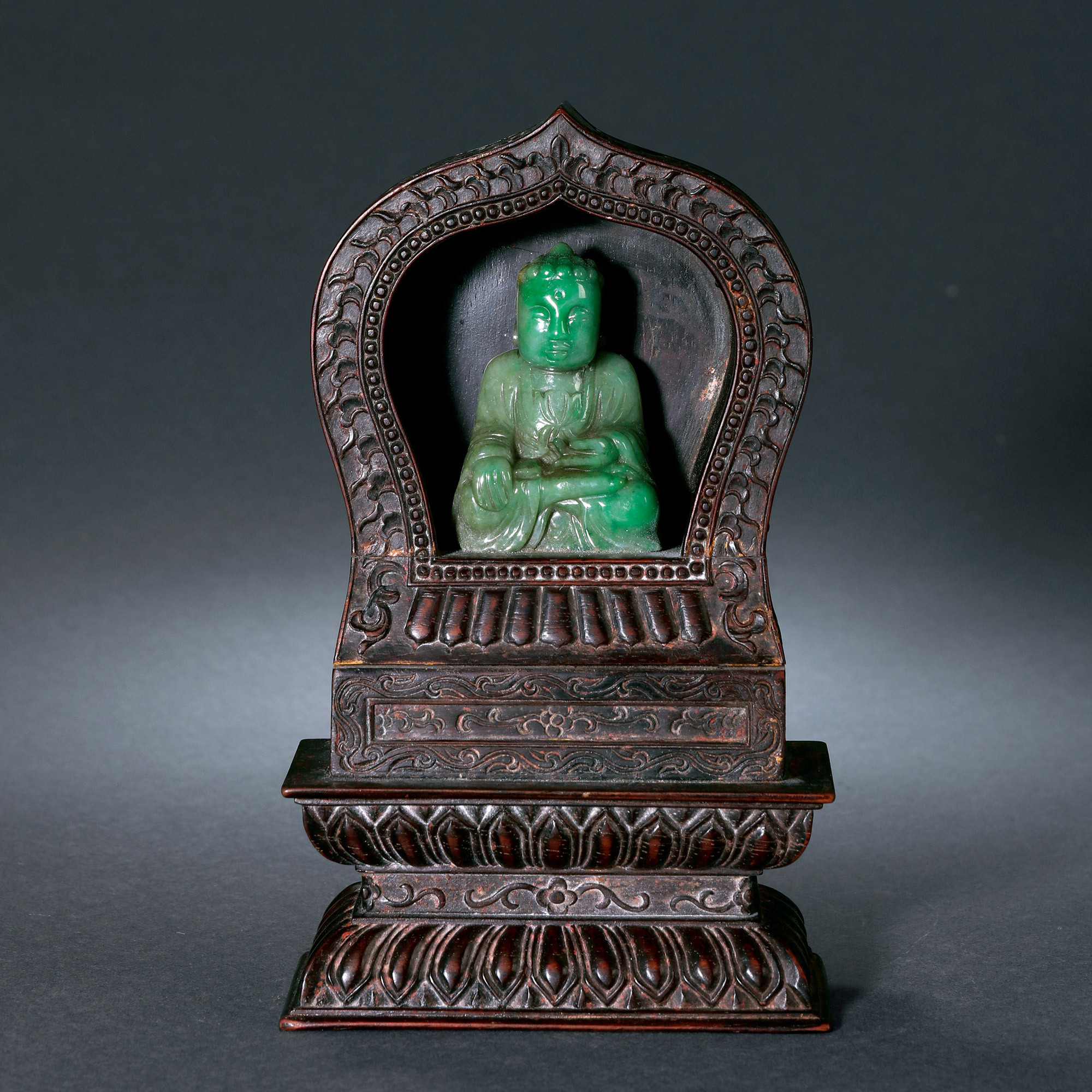 A CARVED ZITAN ‘LOTUS’ NICHE FOR BUDDHA WITH GREENISH-JADE SHAKYAMUNI