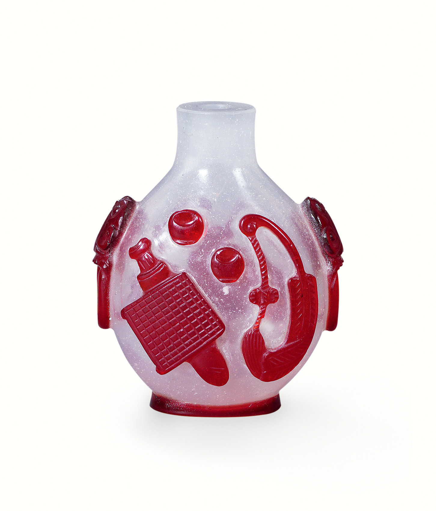 A GLASS SNUFF BOTTLE WITH RED GLASS DECORATION  OVERLAID