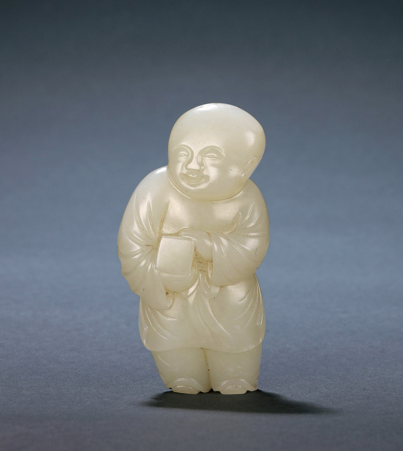A CARVED WHITE JADE‘TREASURE AND BOY’