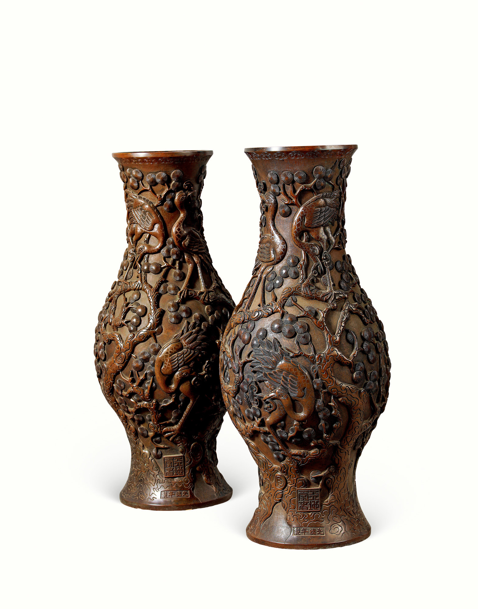 A PAIR OF LARGE CARVED BRONZE‘CRANE AND LONGEVITY’OLIVE-SHAPED VASES