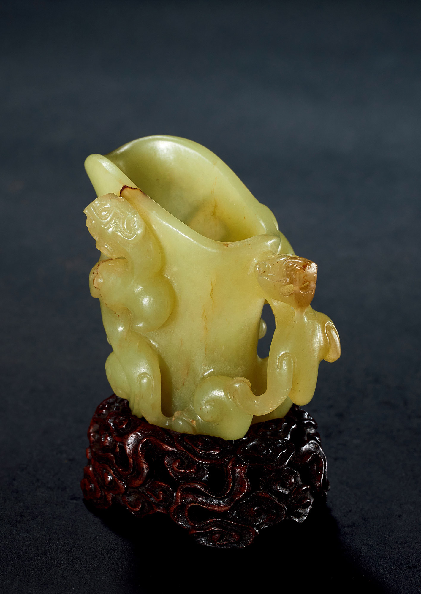 A FINELY CARVED YELLOW-JADE‘DOUBLE CHI-DRAGON’ CUP