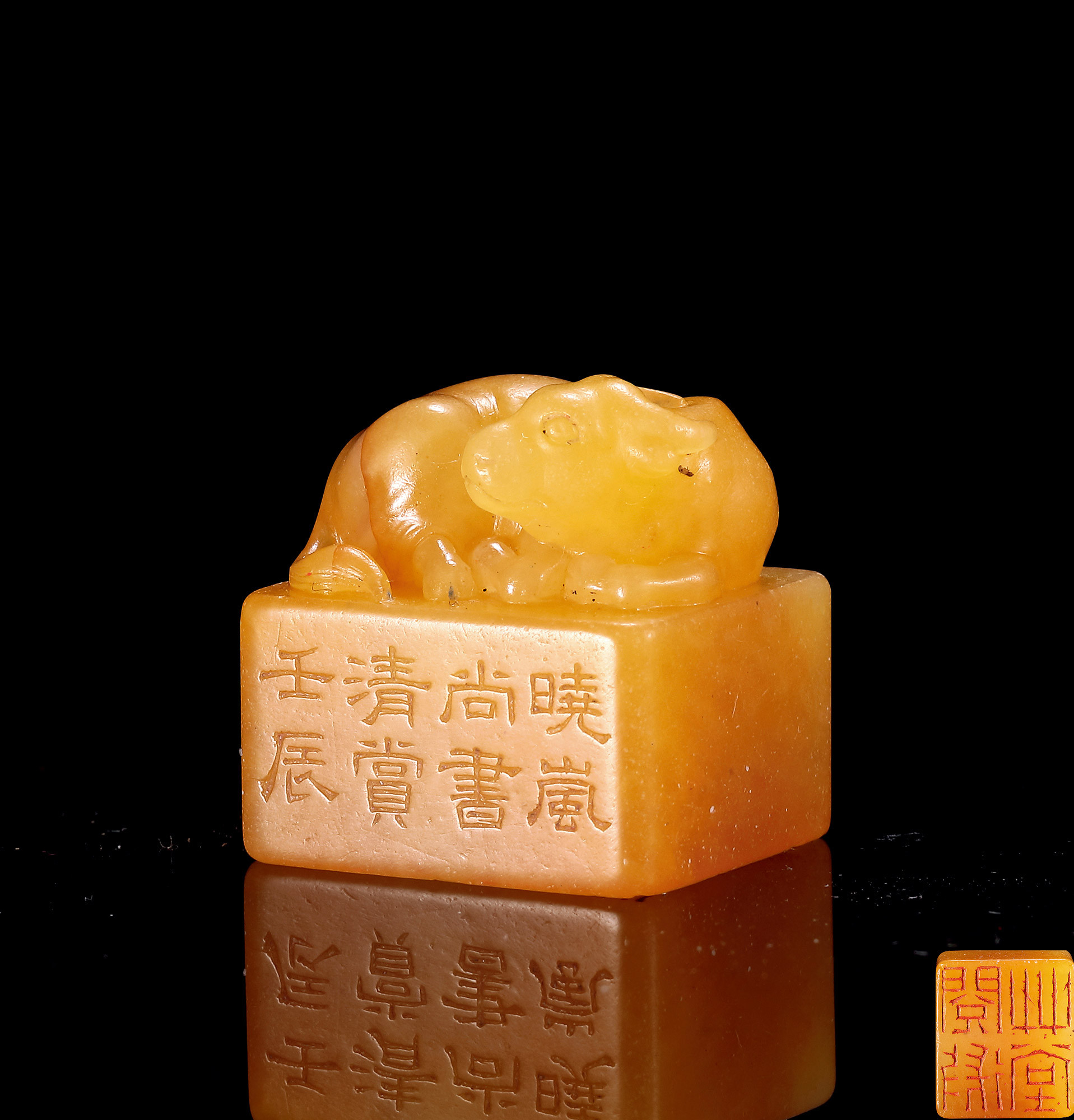 A TIANHUANG STONE SEAL WITH OX-KNOB, CARVED BY GUI FU FOR JI XIAO LAN