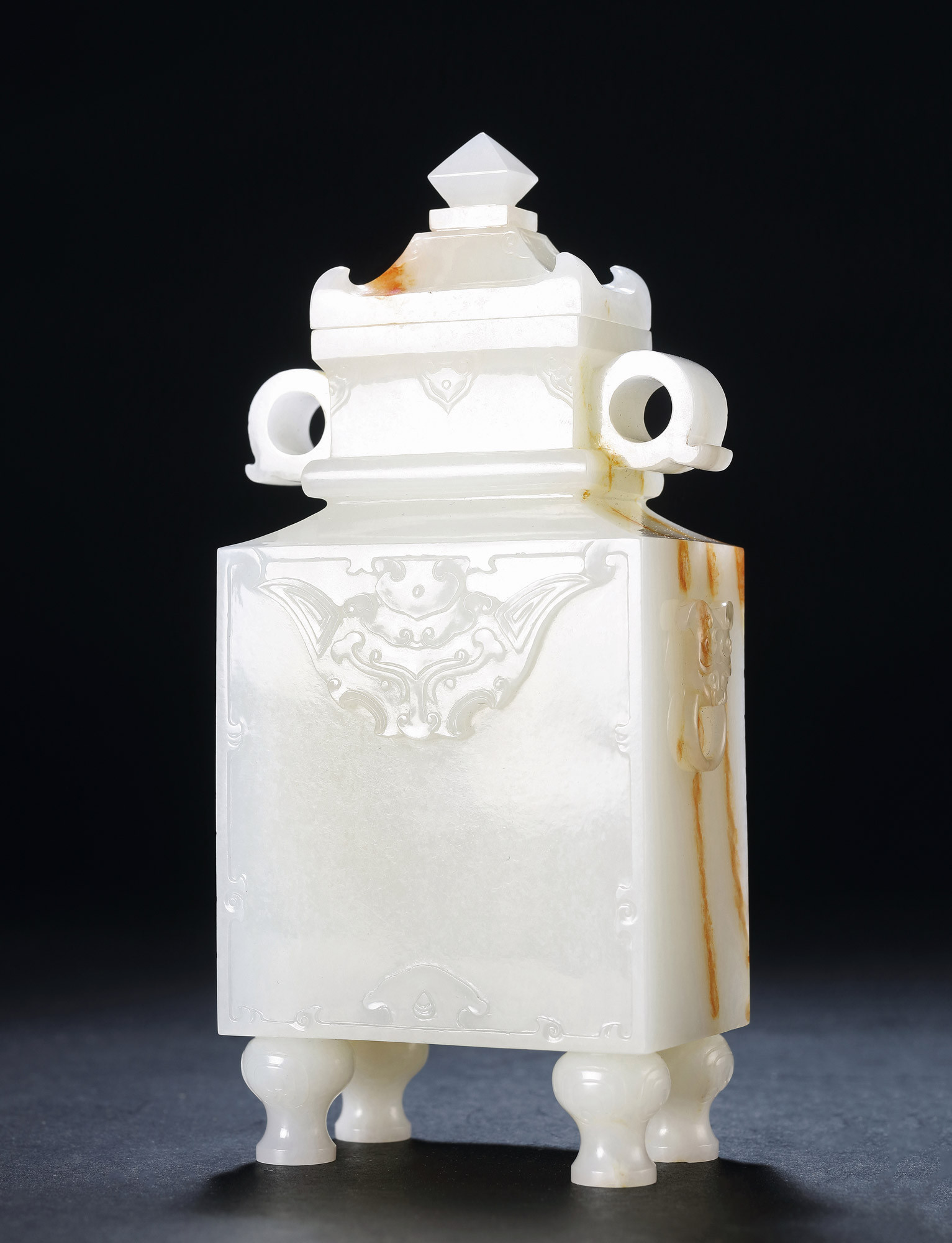 A WHITE JADE SQUARE VASE WITH DESIGN OF BEAST FACE