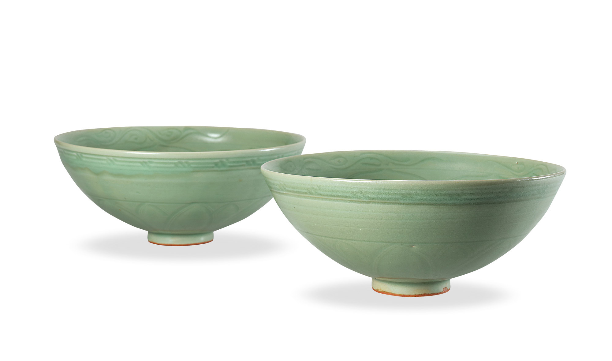 An Important Pair of Longquan Celadon‘Seven Treasures’Bowls