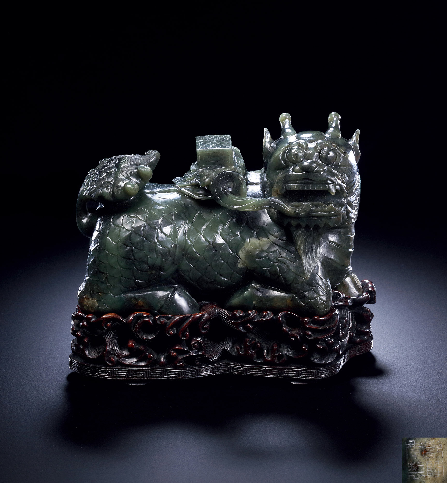 A SPINACH JADE‘QILIN AND BOOK’ORNAMENT