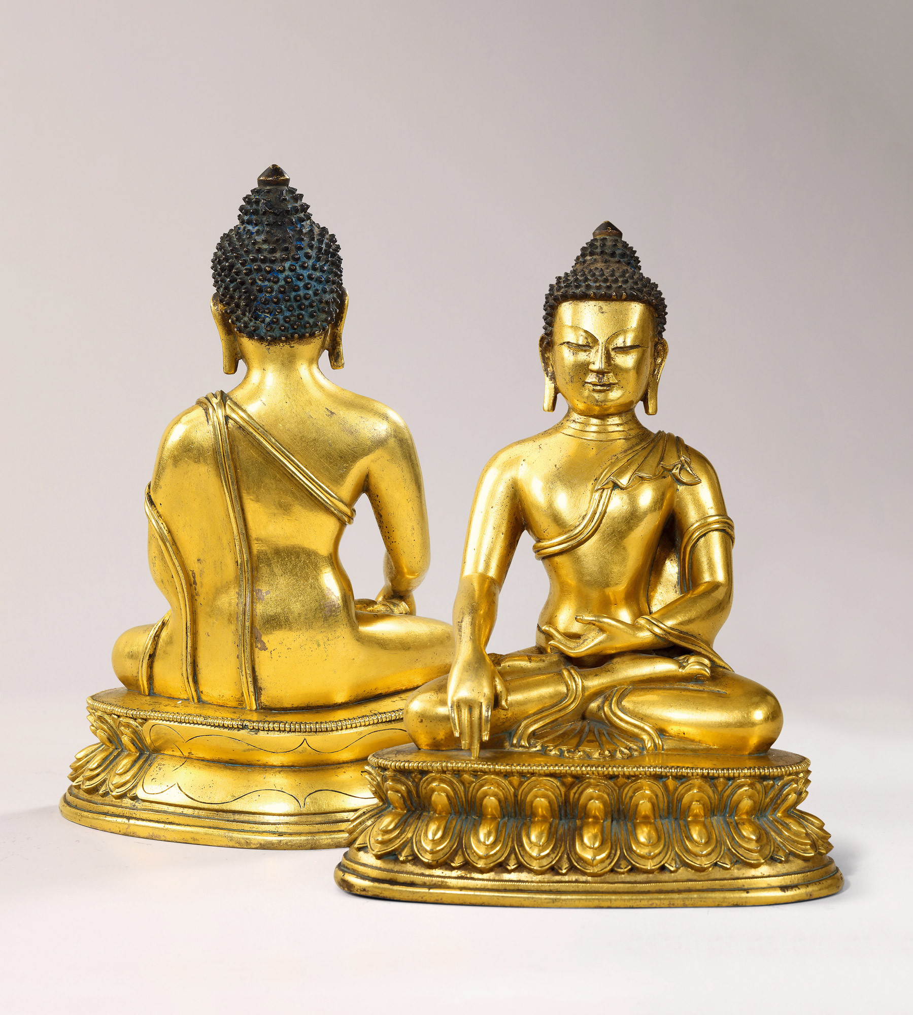 A gilt-bronze figure of sakyamuni
