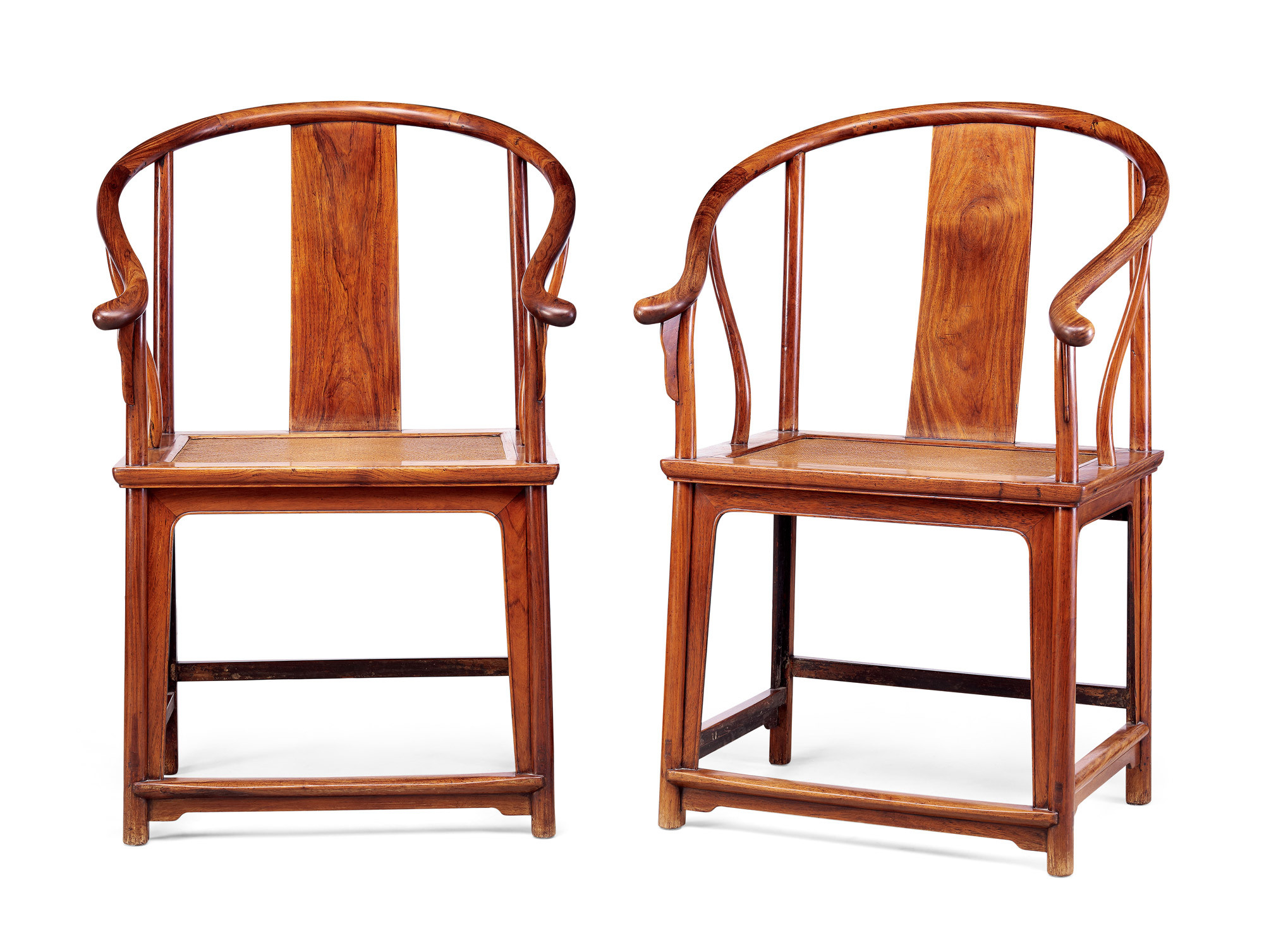 AN EXTREMELY RARE AND IMPORTANT PAIR OF HUANGHUALI ARMCHAIRS, QUANYI