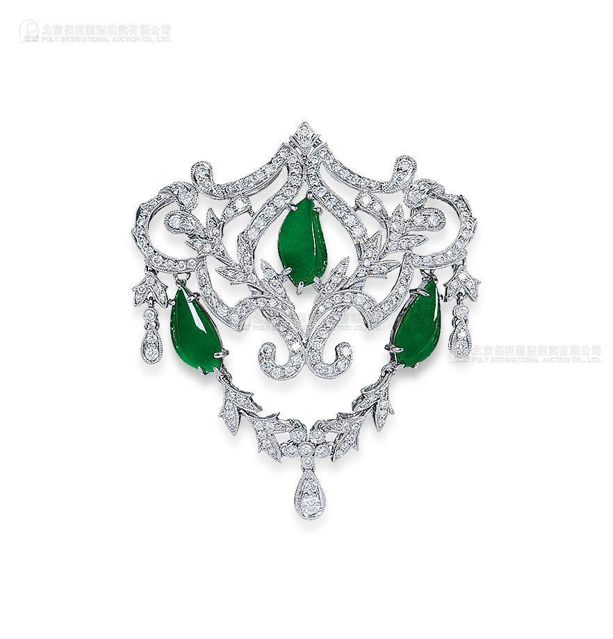 A BURMESE JADEITE AND DIAMOND BROOCH MOUNTED IN 18K WHITE GOLD