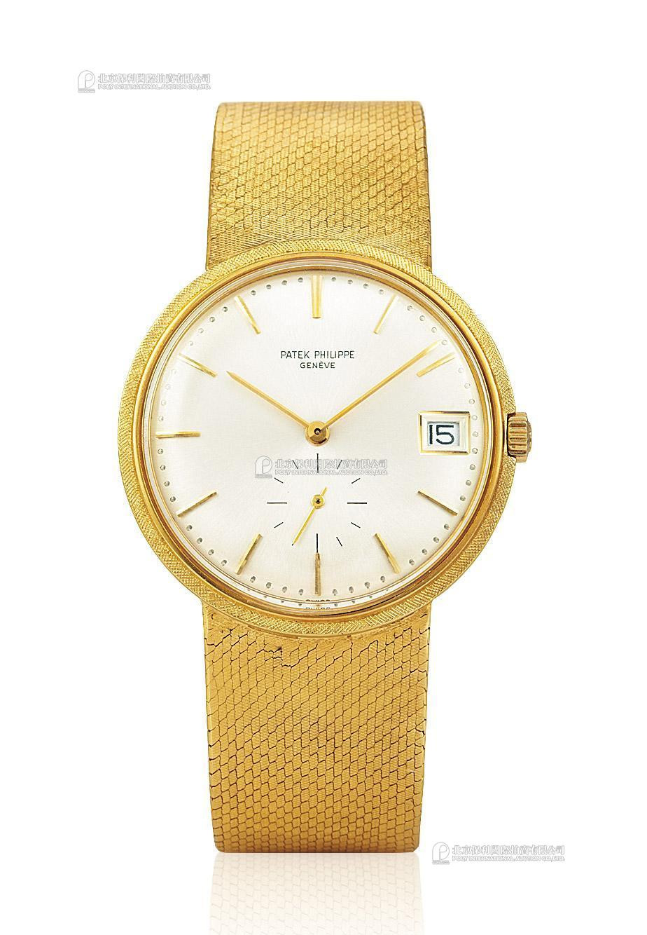 PATEK PHILIPPE A YELLOW GOLD AUTOMATIC WRISTWATCH WITH DATE INDICATION