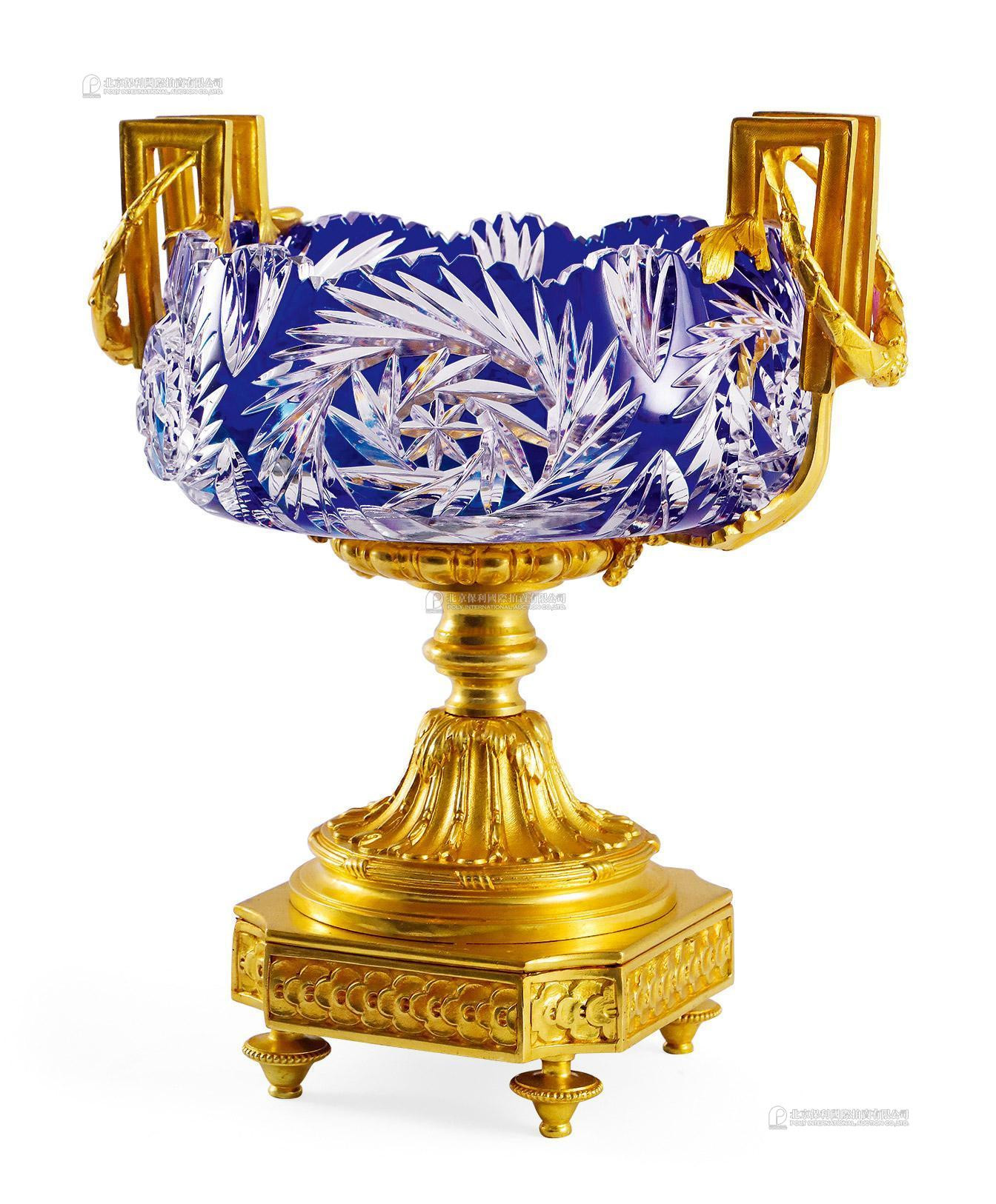 A FRENCH LOUIS XVI STYLE GILT BRONZE AND BLUE CRYSTAL DECORATIVE URN