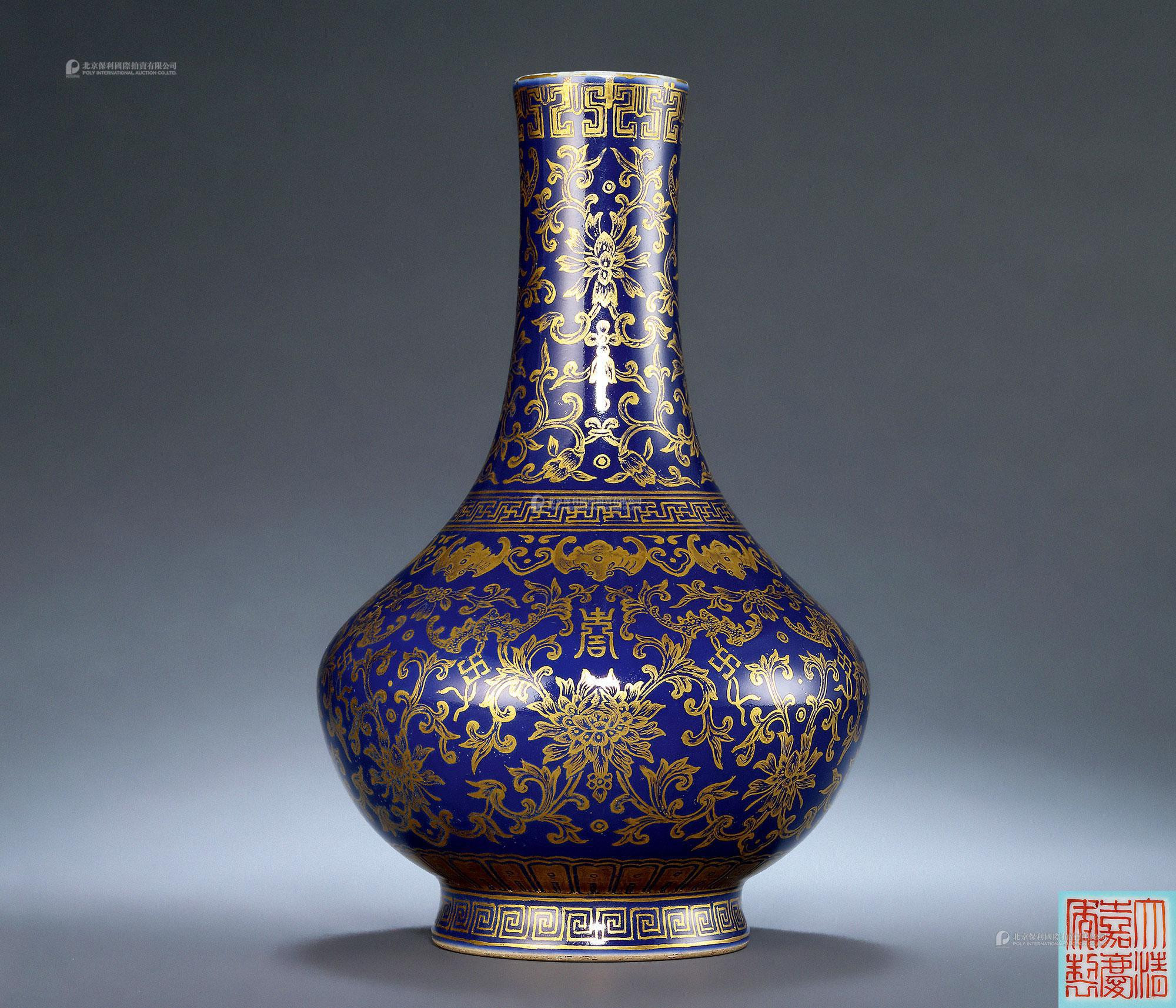 A BLUE-GLAZED AND GILTED LONG NECK VASE