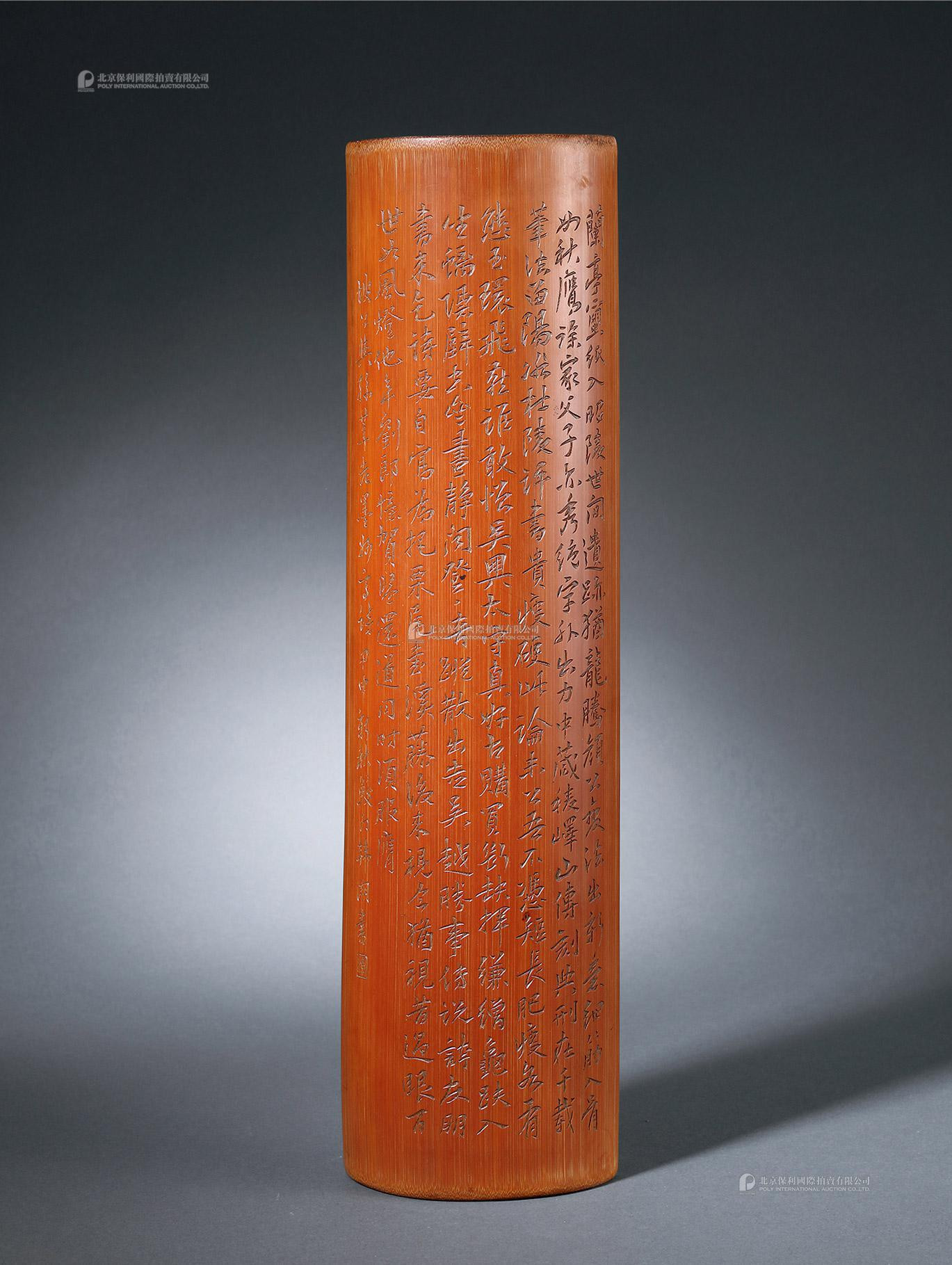 A BAMBOO INSCRIPTED ‘POETRY’ WRISTREST MADE BY HAN JIAOMEN