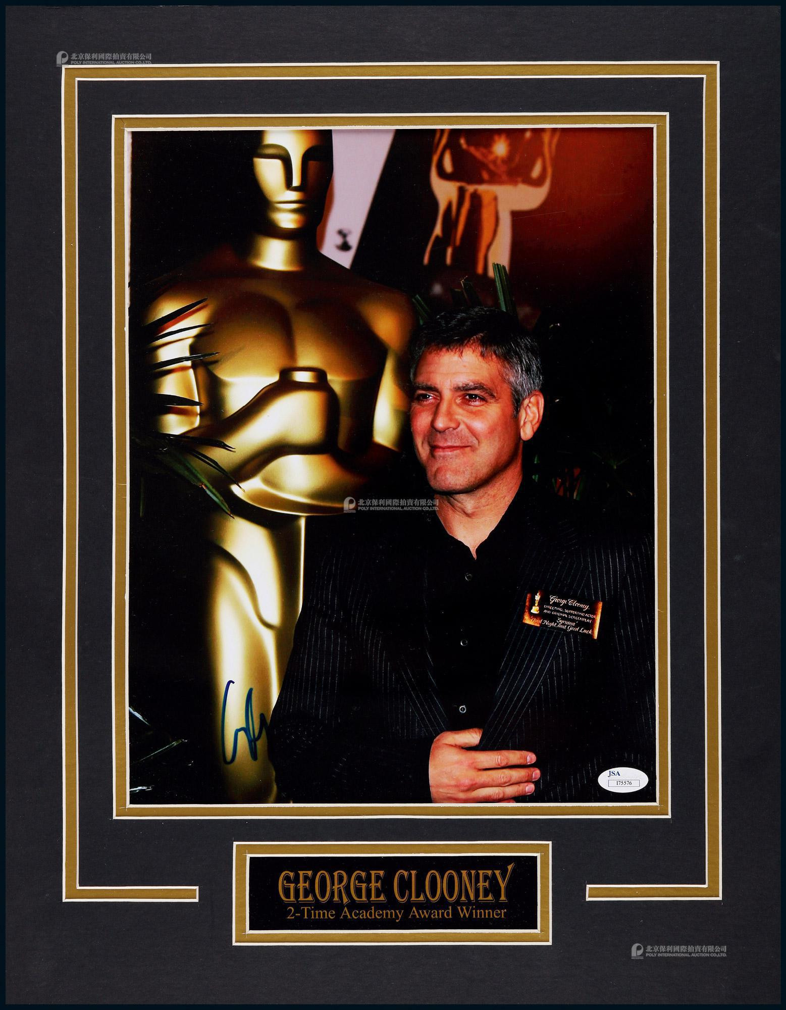 The autographed photo of George Clooney, the “Legendary American movie king” , with certificate