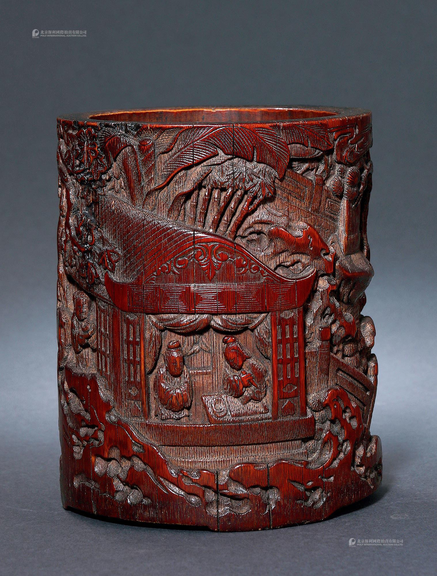 A BAMBOO CARVED ‘SCHOLARS TRAVELING’ BRUSH POT