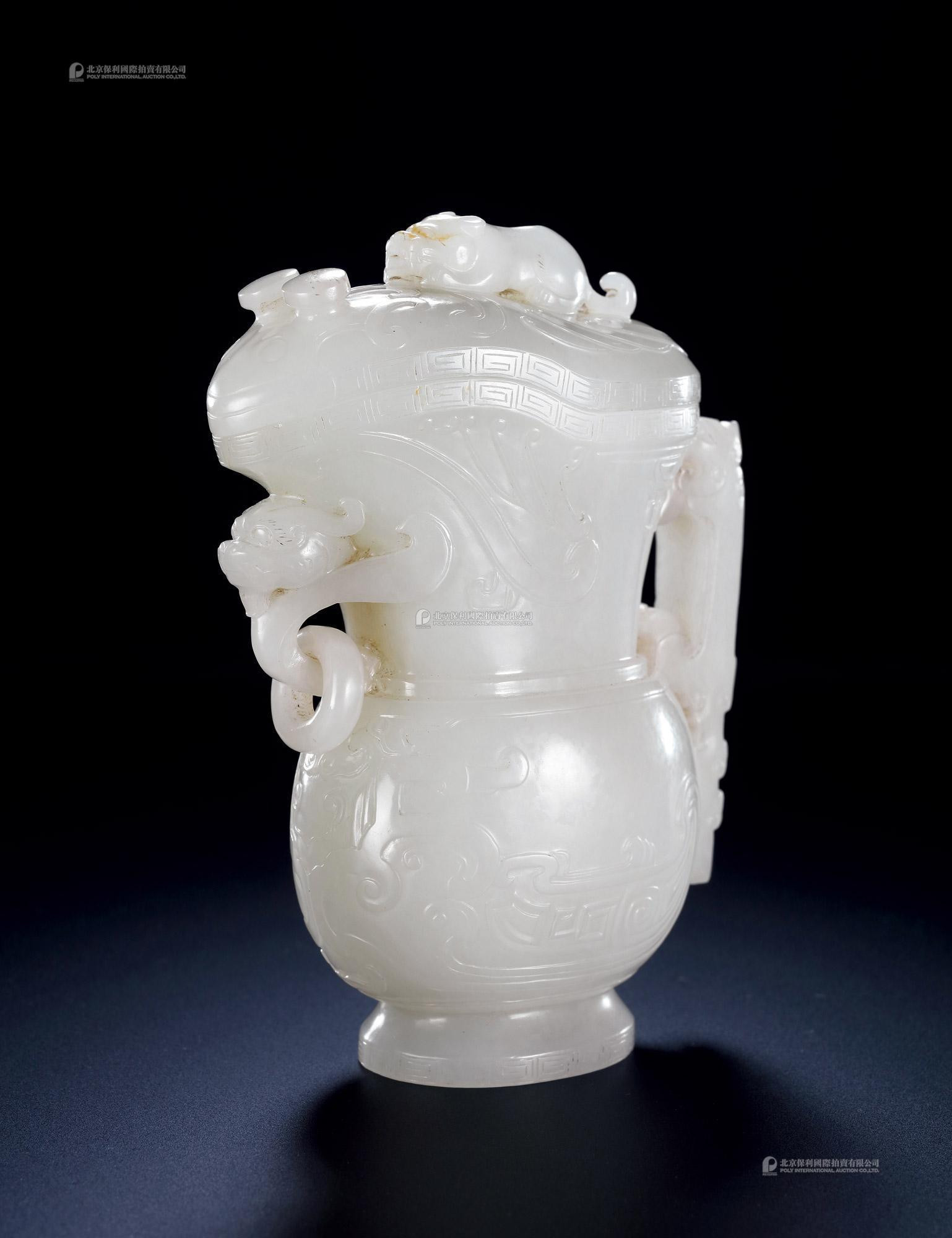 A WHITE JADE LIBATION CUP AND COVER WITH KUI-DRAGON DESIGN